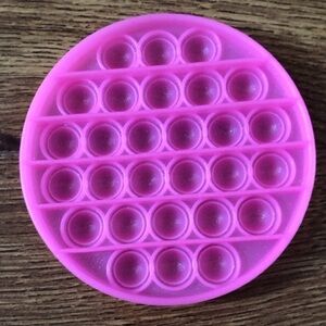 Pop it pink round toy